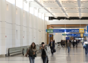 Passengers walking through Evans Terminal